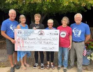 3Bear Donation The 3Bear July 4 Races donated $2,500 to Great Headwaters Trails Foundation (GHTF) last week. Taking part in the check presentation were, from left, John Gustavson, GHTF treasurer and board member; Cheryl Pytlarz, Lando Center owner and race committee member; Erin Luoto, Luoto’s Fitness owner and race committee member; Cheryl Adams, GHTF board member and Friends of the Conover-Phelps Trail; Rita Bogolub, race committee member; and Neal Adams, GHTF board member and Friends of the Conover/Phelps Trail.
—Photo By Gary Ridderbusch